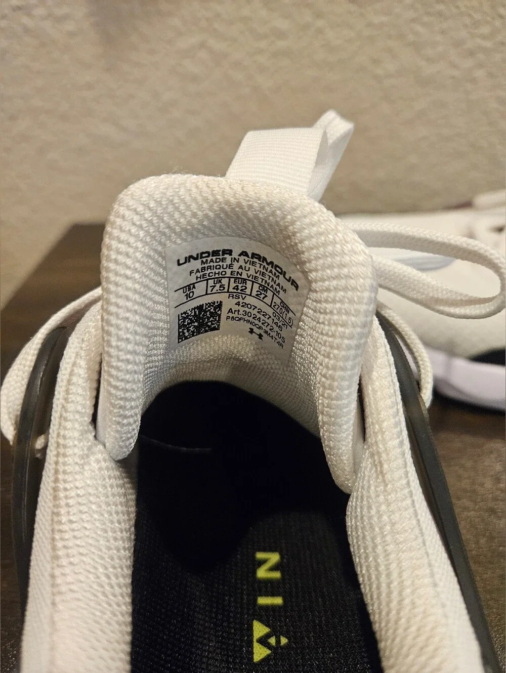 White and Black Athletic Sneakers with Neon Yellow Accent